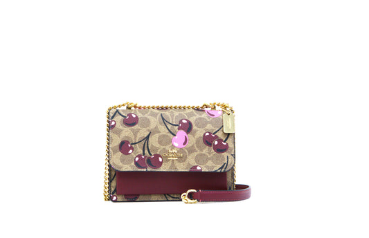 Coach Mini Klare Crossbody Bag In Signature Canvas With Cherry Print - Tan Multi