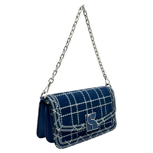Kate Spade New York Dakota Denim Check Convertible Crossbody Bag in indigo with check pattern and shoulder strap.