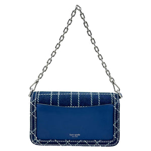 Kate Spade New York Dakota Denim Check Convertible Crossbody Bag in indigo, featuring a stylish denim pattern and adjustable shoulder strap.