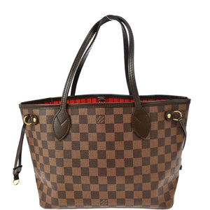 Designer handbag with checkered pattern on a white background