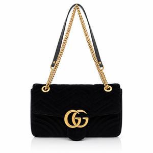 Gucci GG Marmont Medium Black Velvet Matelasse Shoulder Bag Chain Strap with a gold-tone chain strap and a prominent interlocking G logo on the front, set against a plain white background.