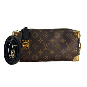 A Louis Vuitton monogram canvas zip pouch with gold-tone hardware and a detachable black shoulder strap, displayed on a white reflective surface.