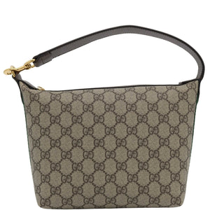 Patterned handbag with a visible brand logo on a white background