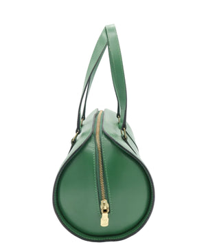 A green leather cylindrical handbag with a gold zipper and a single top handle, photographed against a plain white background.