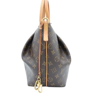 A Louis Vuitton monogram canvas shoulder bag in brown with tan leather trim and gold-tone hardware, shown from the side against a white background.