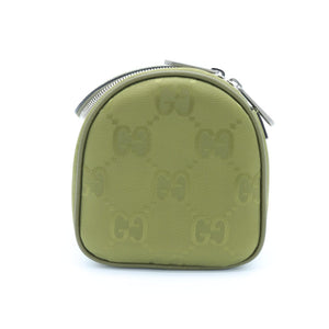 A small olive green Gucci zippered pouch featuring the brand's signature GG monogram pattern, shown against a plain white background.
