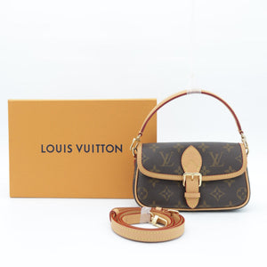 A Louis Vuitton monogram handbag in brown coated canvas with tan leather trim and strap, shown next to its tan Louis Vuitton box on a white background.