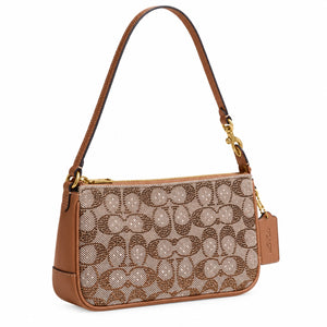 Coach Plaza Mini Shoulder Bag in Crystal Signature Jacquard, angled view showing leather side panel