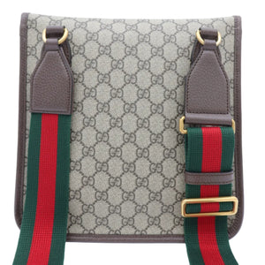 Gucci shoulder bag in GG Supreme canvas with brown leather trim, gold-tone hardware, and a signature green and red web stripe detail on the strap, shown against a plain white background.