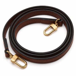 A coiled brown leather strap with gold-tone metal hardware, including two lobster clasp connectors, shown on a plain white background. Louis Vuitton Pallas Clutch Monogram Noir Black 2-Way Chain Crossbody Bag