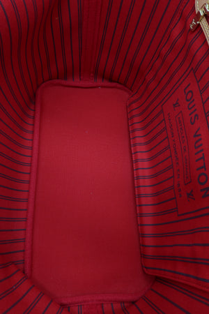 Pre-Owned Louis Vuitton Monogram Tote Bag – Brown – Close-up of the interior lining of a Louis Vuitton bag in red canvas