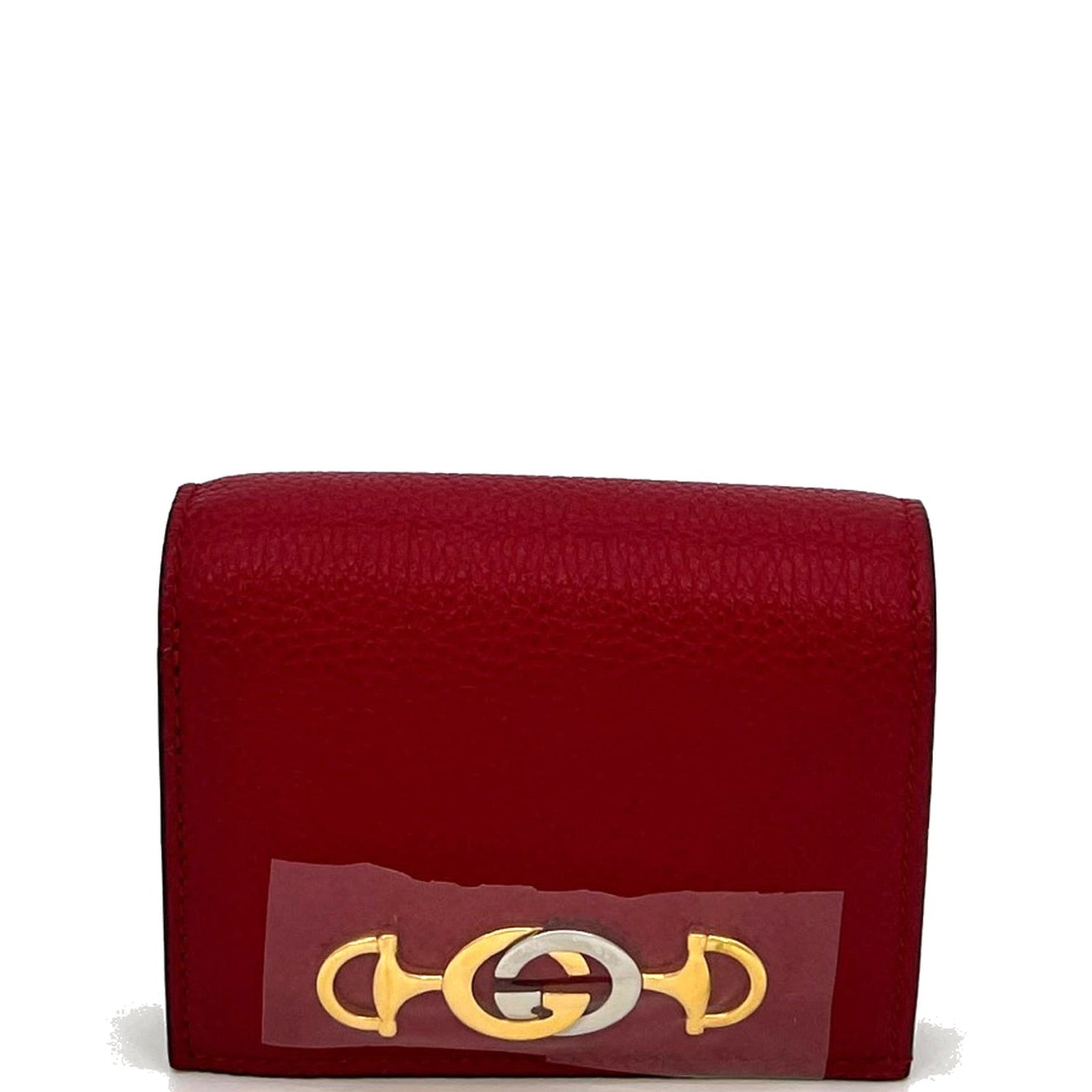 Red wallet with a gold and white logo on a white background