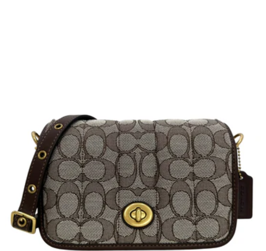Coach Dinky 18 en jacquard exclusivo con acolchado