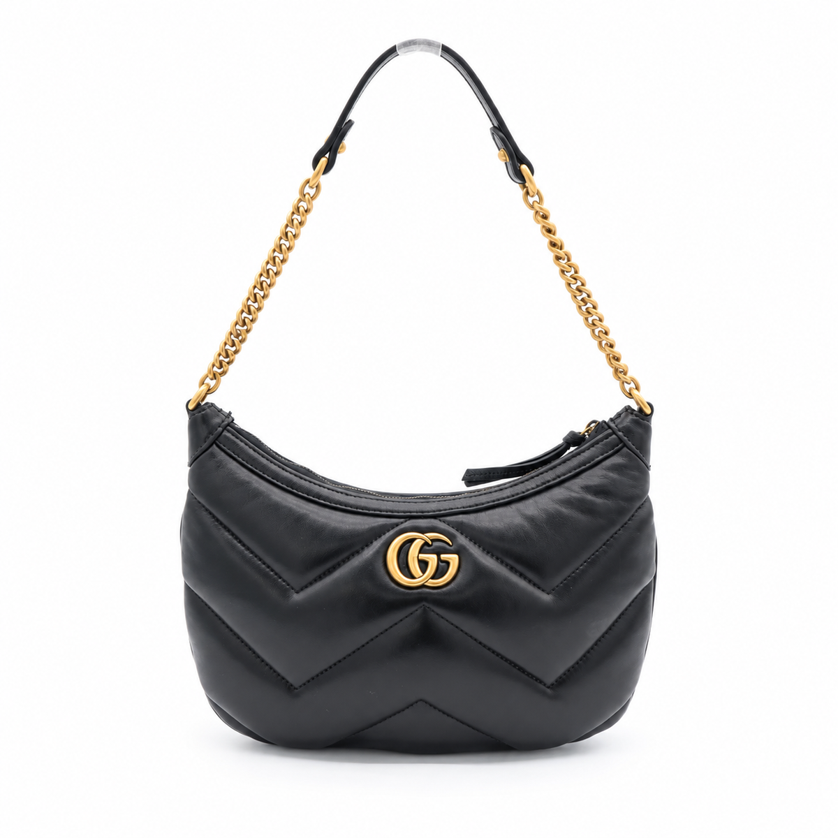 A black quilted leather shoulder bag with a gold-tone interlocking G logo on the front, featuring a gold chain strap and black leather shoulder strap on a white background.
