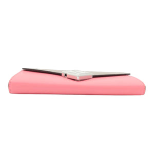 A pink leather clutch wallet with a silver-toned metal clasp and a dark brown leather folded flap, shown on a plain white background.