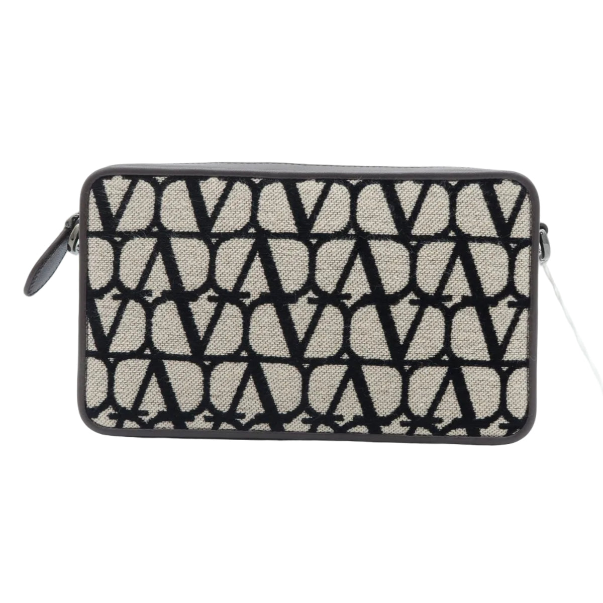 A rectangular clutch bag with a black and beige geometric pattern, featuring a top zipper closure and a small black leather loop on the left side, set against a plain white background.