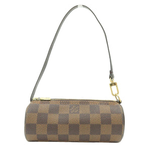 A Louis Vuitton cylindrical shoulder bag in the Damier Ebene checkered canvas, featuring a brown and tan checkerboard pattern, a dark brown leather strap, and gold-tone hardware.