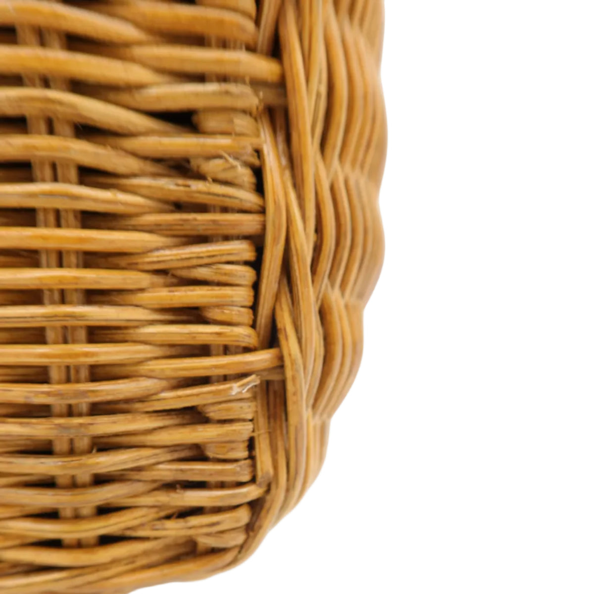 Close-up detail of a woven wicker basket corner in a natural light brown color, set against a plain white background.