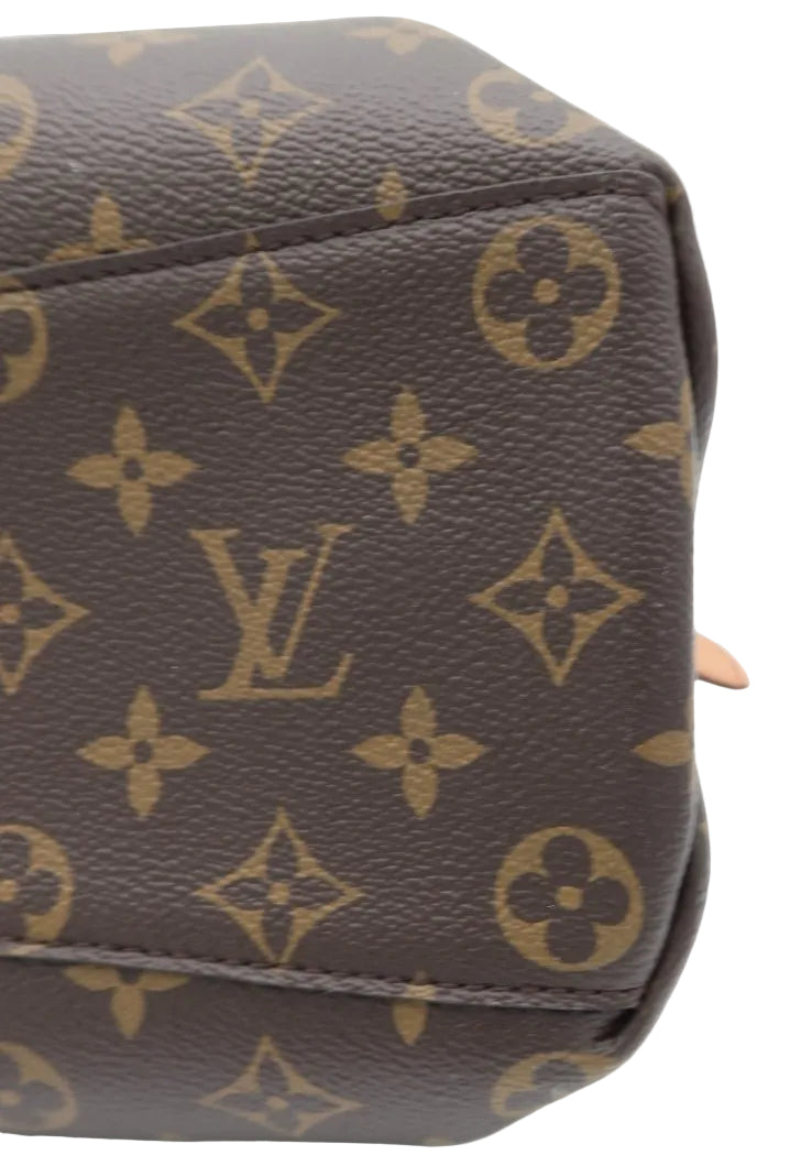 Close-up of a brown monogram canvas bag corner showing the classic Louis Vuitton LV logo and floral motifs on a white background.