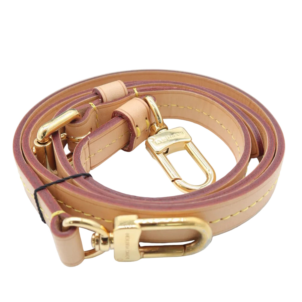 A tan leather shoulder strap with gold-tone hardware, including a lobster clasp and D-ring, coiled on a white background.