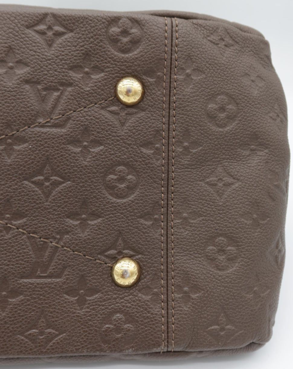 Brown loafer shoe on a white background