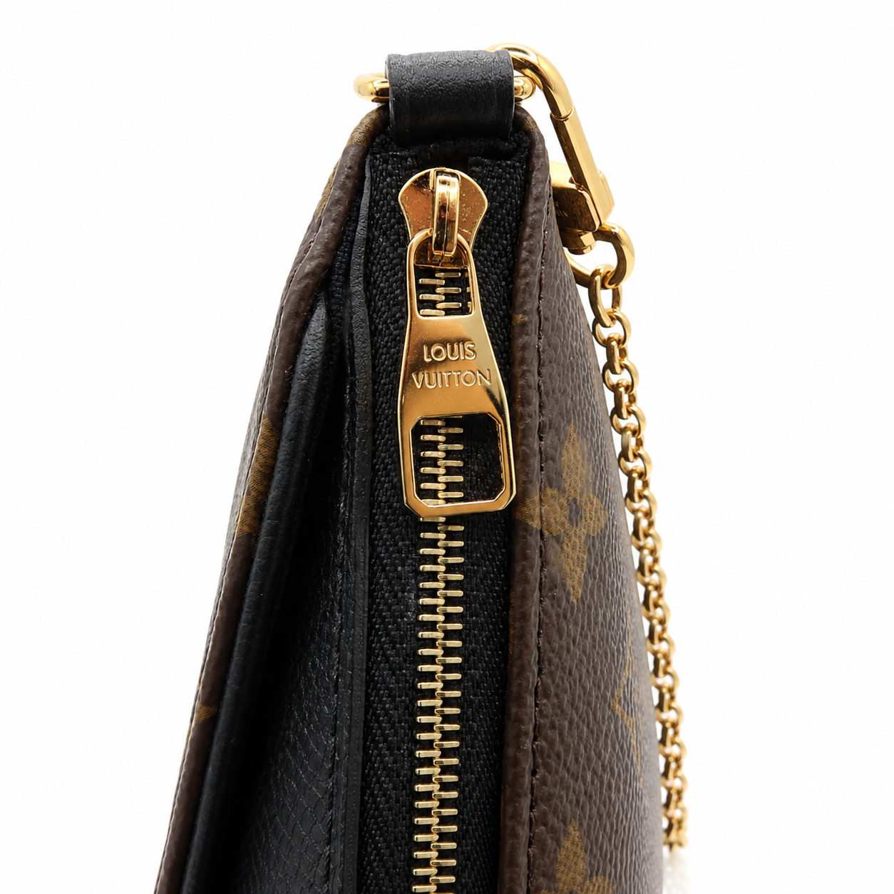 Louis Vuitton Pallas Clutch Monogram Noir Black 2-Way Chain Crossbody Bag Close-up of a Louis Vuitton monogram wristlet or pouch showing the gold-tone zipper pull engraved with the brand name, black leather trim, and a gold chain link on a white background.