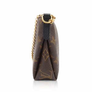 Louis Vuitton Pallas Clutch Monogram Noir Black 2-Way Chain Crossbody Bag with a gold chain strap and black leather tab, shown from the side on a white background.
