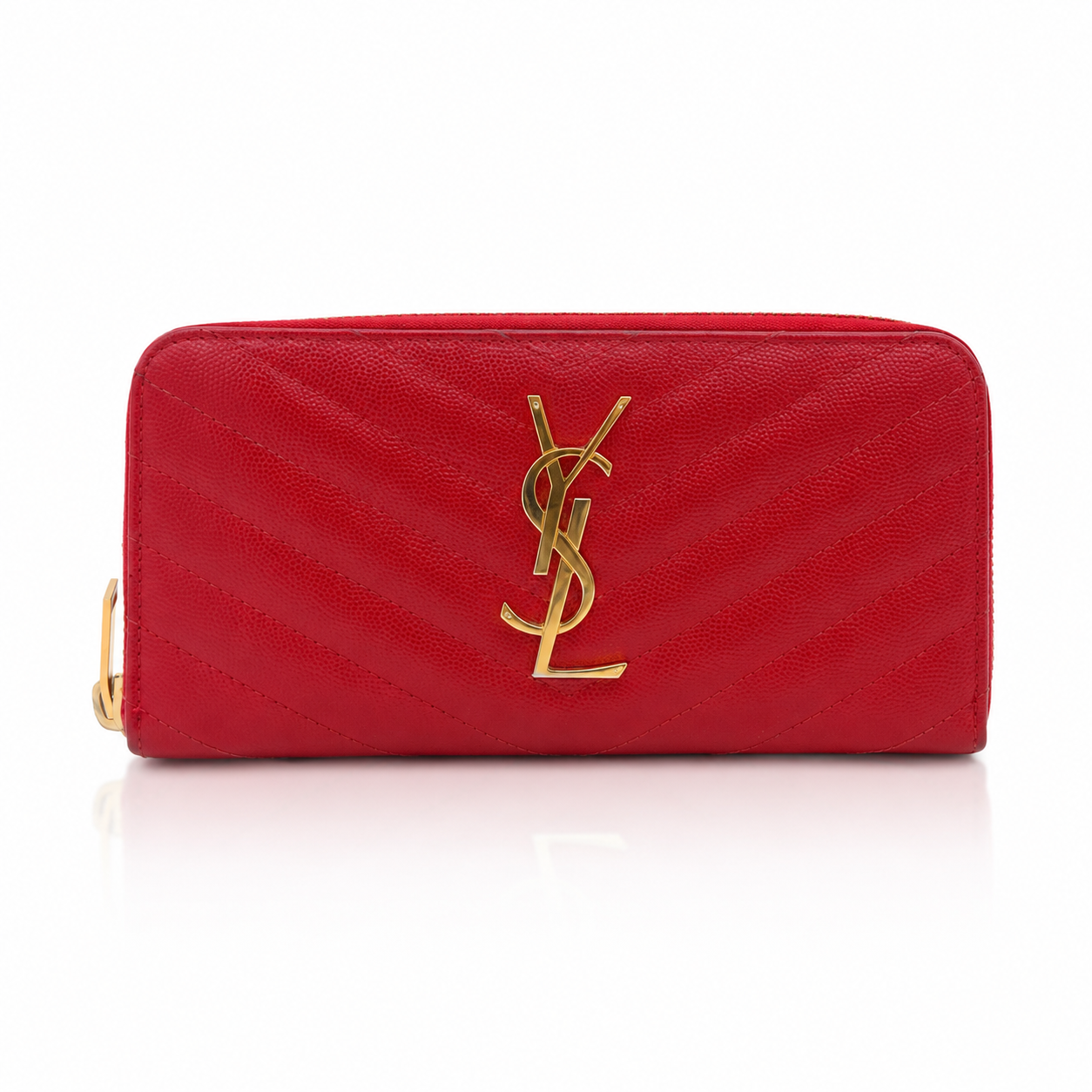 A red Saint Laurent zip-around wallet in textured caviar leather with a gold-tone YSL logo on the front, set against a plain white background.
