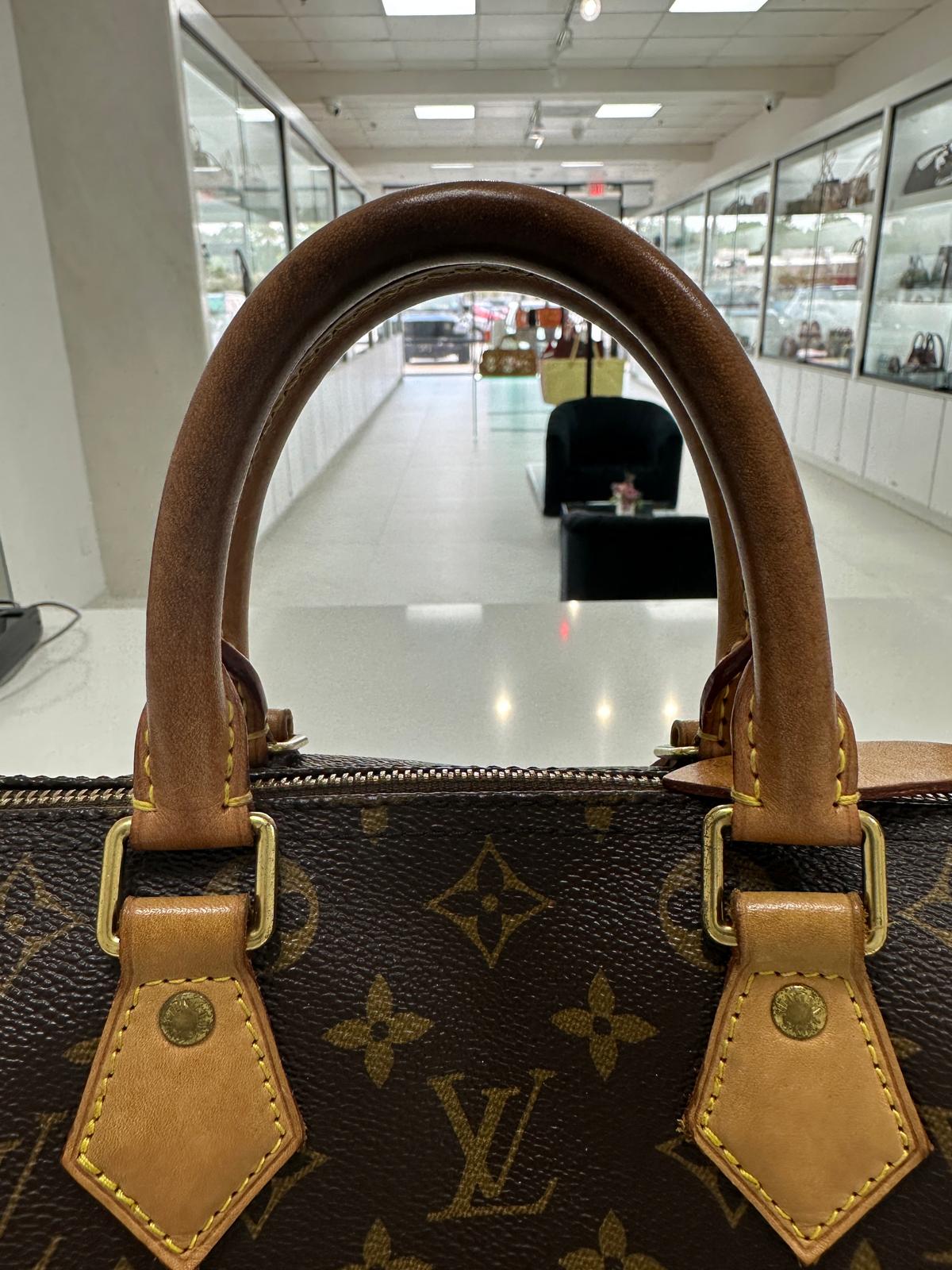 Louis Vuitton Monogram Speedy 25 - PRE OWNED