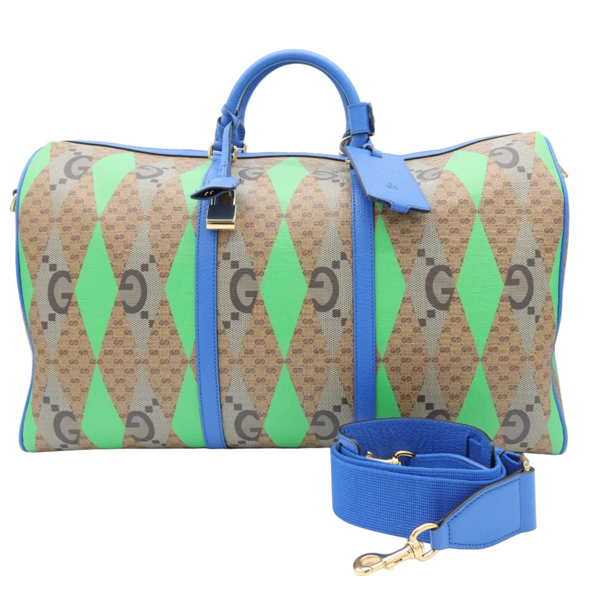 A Gucci duffle bag in brown GG Supreme monogram canvas with bright green and blue diamond pattern panels, featuring blue leather handles and a matching blue detachable shoulder strap on a white background.