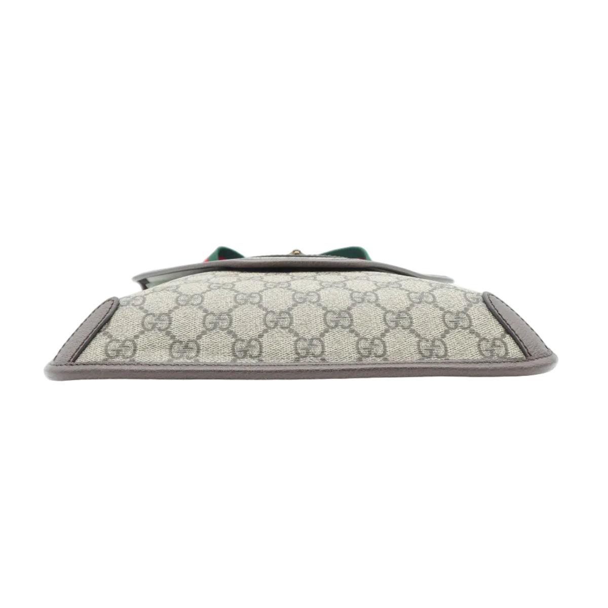 A Gucci clutch bag in beige GG Supreme canvas with brown leather trim and a green bow detail on the front, shown against a plain white background.