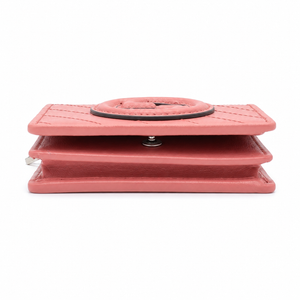 Gucci Pink Leather Card Holder Wallet with Interlocking GG Logo & Snap Closure – a coral pink leather wallet with a circular