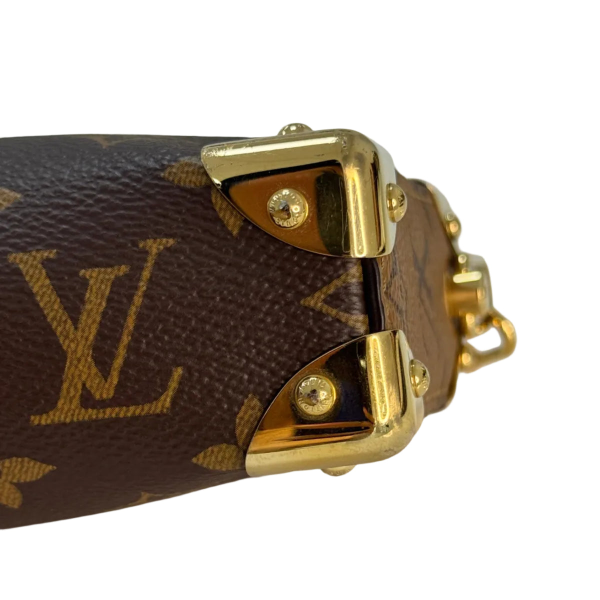 Louis Vuitton Slim Trunk Monogram Canvas Shoulder Crossbody Bag – Close-up of a Louis Vuitton monogram handbag in brown