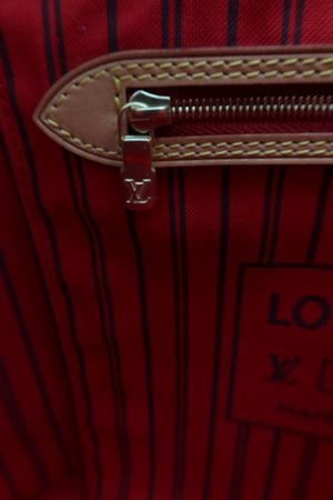 Pre-Owned Louis Vuitton Monogram Tote Bag – Brown – Close-up of a Louis Vuitton red striped bag interior showing a tan