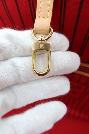 Pre-Owned Louis Vuitton Monogram Tote Bag – Brown – a close-up of a gold-tone metal D-ring clasp with an embossed Louis