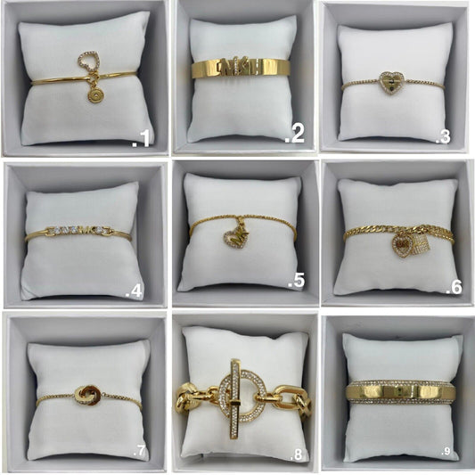 Michael Kors Gold Tone Stainless Steel Bracelets